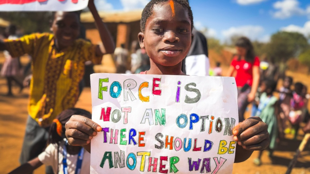 Balaka, Malawi: the Summer School ends with a rally for peace, children and adults marching through the streets of the city