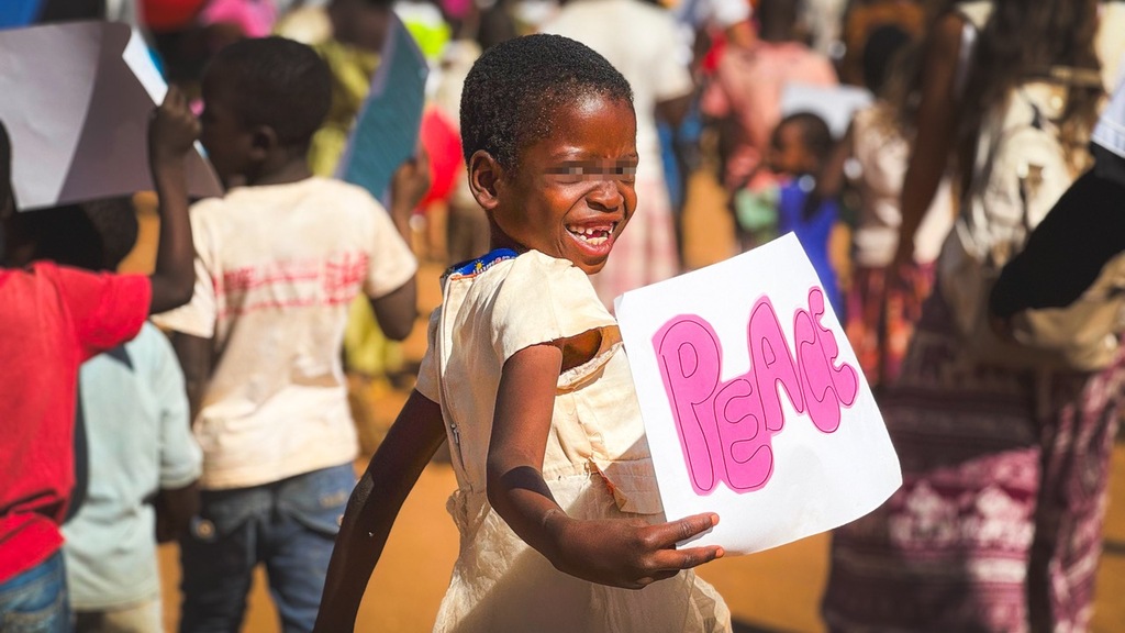 Balaka, Malawi: the Summer School ends with a rally for peace, children and adults marching through the streets of the city